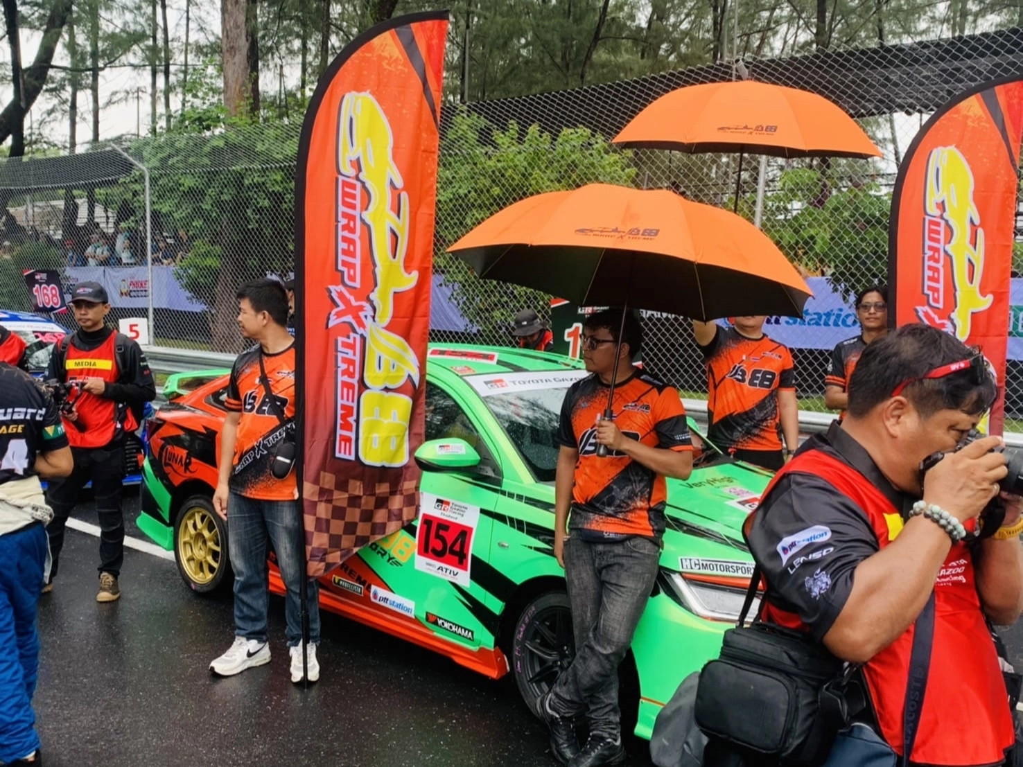 Close-up shot of racing cars speeding by